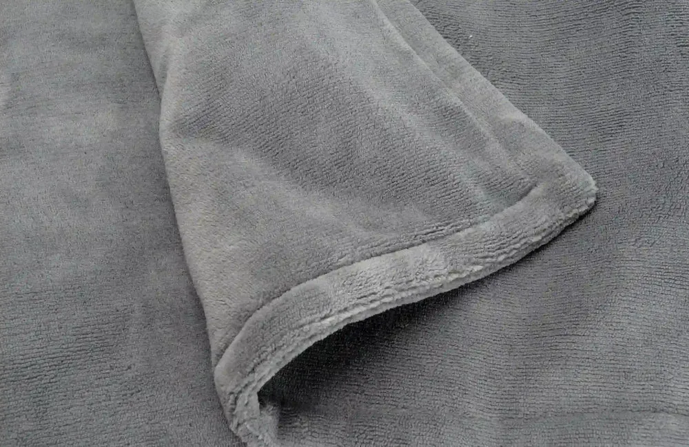 Terraillon S&auml;hk&ouml;l&auml;mmitteinen peitto Plaid Cozy 160 x 120 cm, tummanharmaa