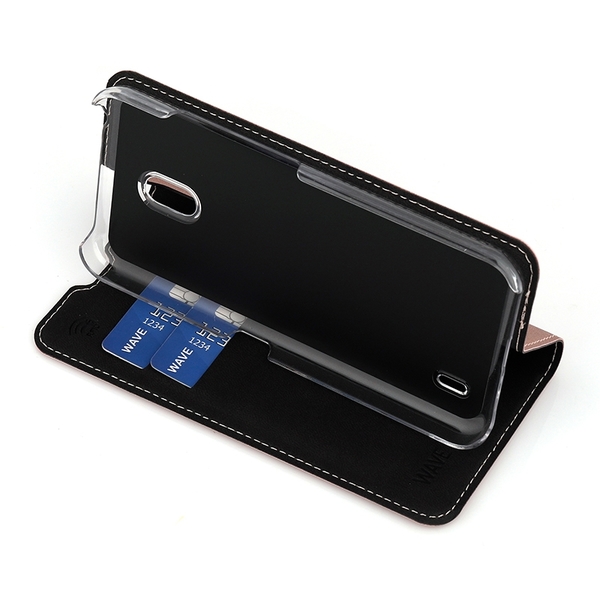 Wave Book Case ruusukultainen suojakotelo Nokia 2.2 (2019) puhelimelle. Magneettisulkuinen kansi, korttipaikat RFID suojauksella ja l&auml;pin&auml;kyv&auml; muovikelkka (PC).