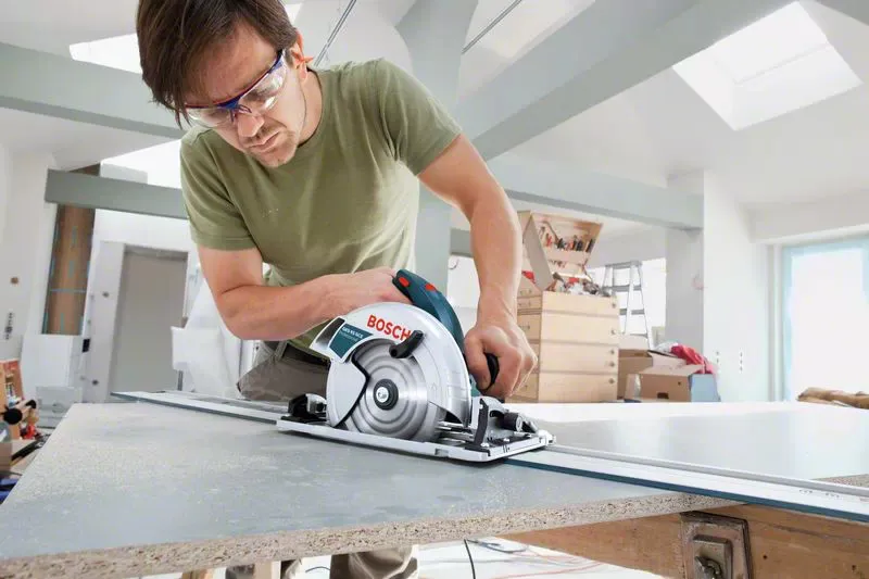 Bosch Hand-held circular saw GKS 65 GCE Professional (blue, 1800 watts, L-BOXX, guide rail FSN 1400)
