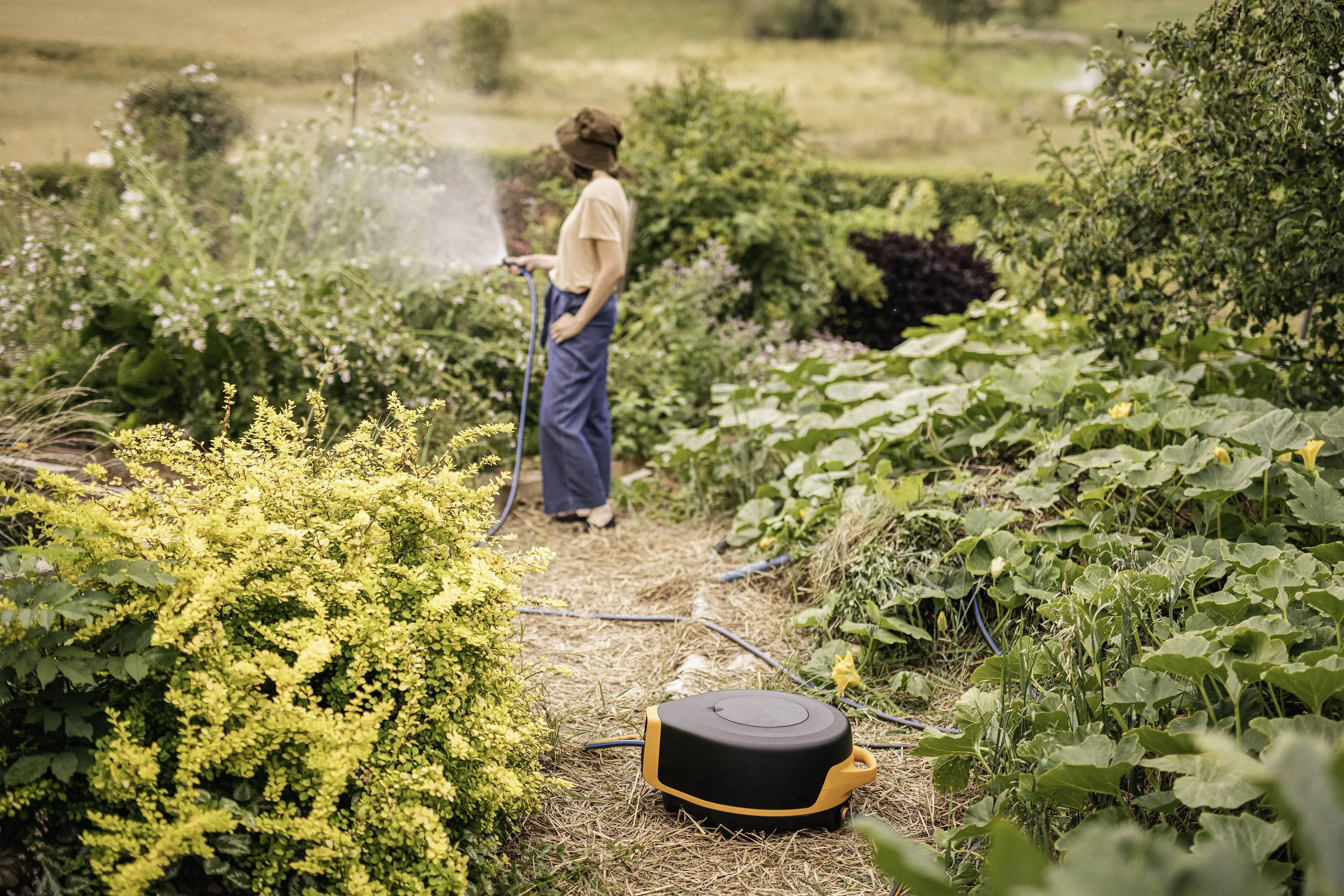 Fiskars X-series, XL - automaattinen k&auml;rrykastelukela, 20m