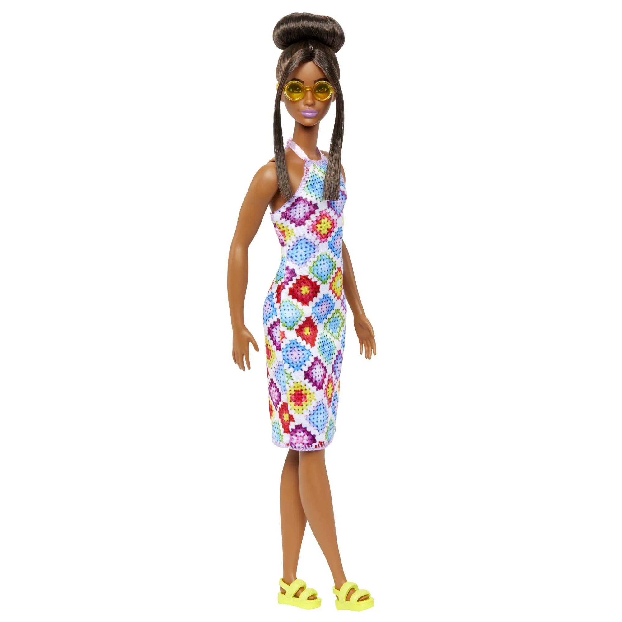 Mattel Barbie Fashionistas doll wearing a bun and crocheted dress