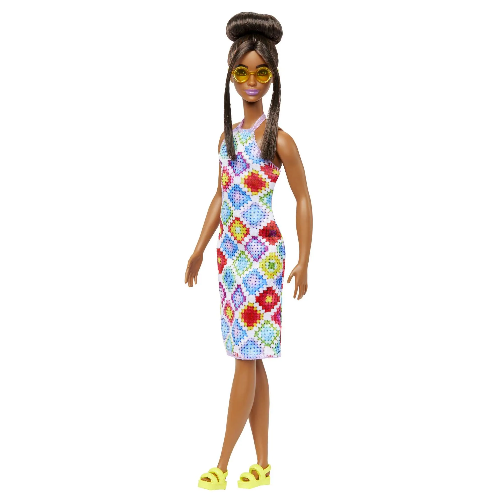 Mattel Barbie Fashionistas doll wearing a bun and crocheted dress