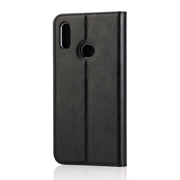 WAVE Book Case musta suojakotelo Huawei P Smart 2019 puhelimelle. Magneettisulkuinen kansi, korttipaikat RFID suojauksella ja l&auml;pin&auml;kyv&auml; muovikelkka (PC). Pinta