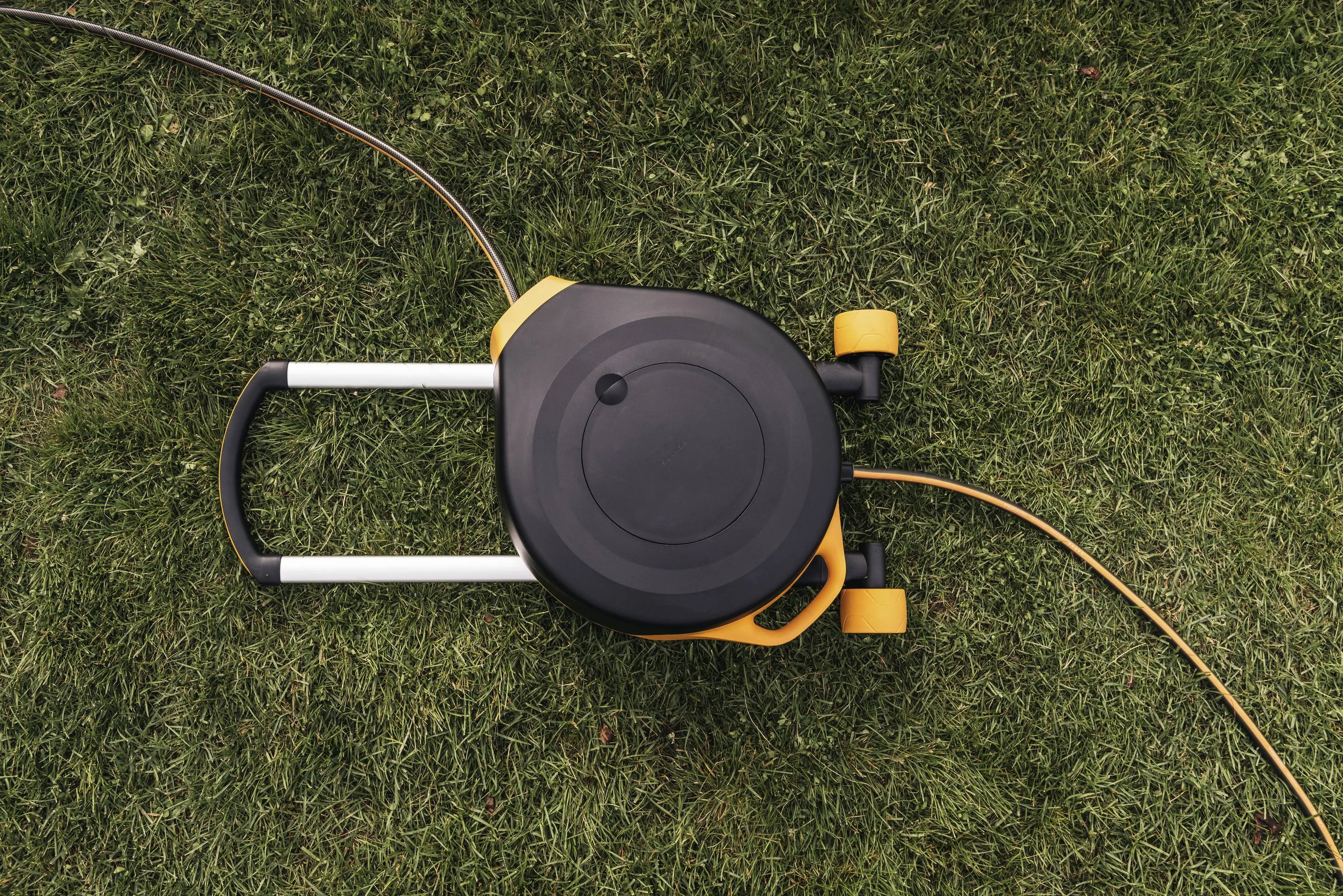 Fiskars X-series, XL - automaattinen k&auml;rrykastelukela, 20m