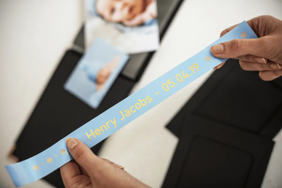 24 mm gold on light blue satin ribbon (4 meter)