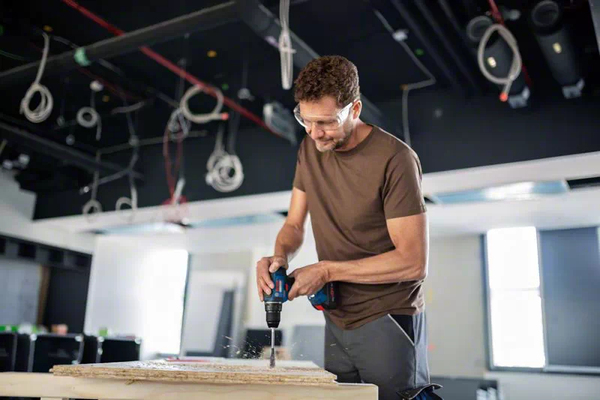 Bosch battery combo kit GDR 18V-200 Professional + GSR 18V-55 Professional, 18Volt, tool set (blue/black, 2x Li-ion battery 4.0Ah, impact wrench and drill drive