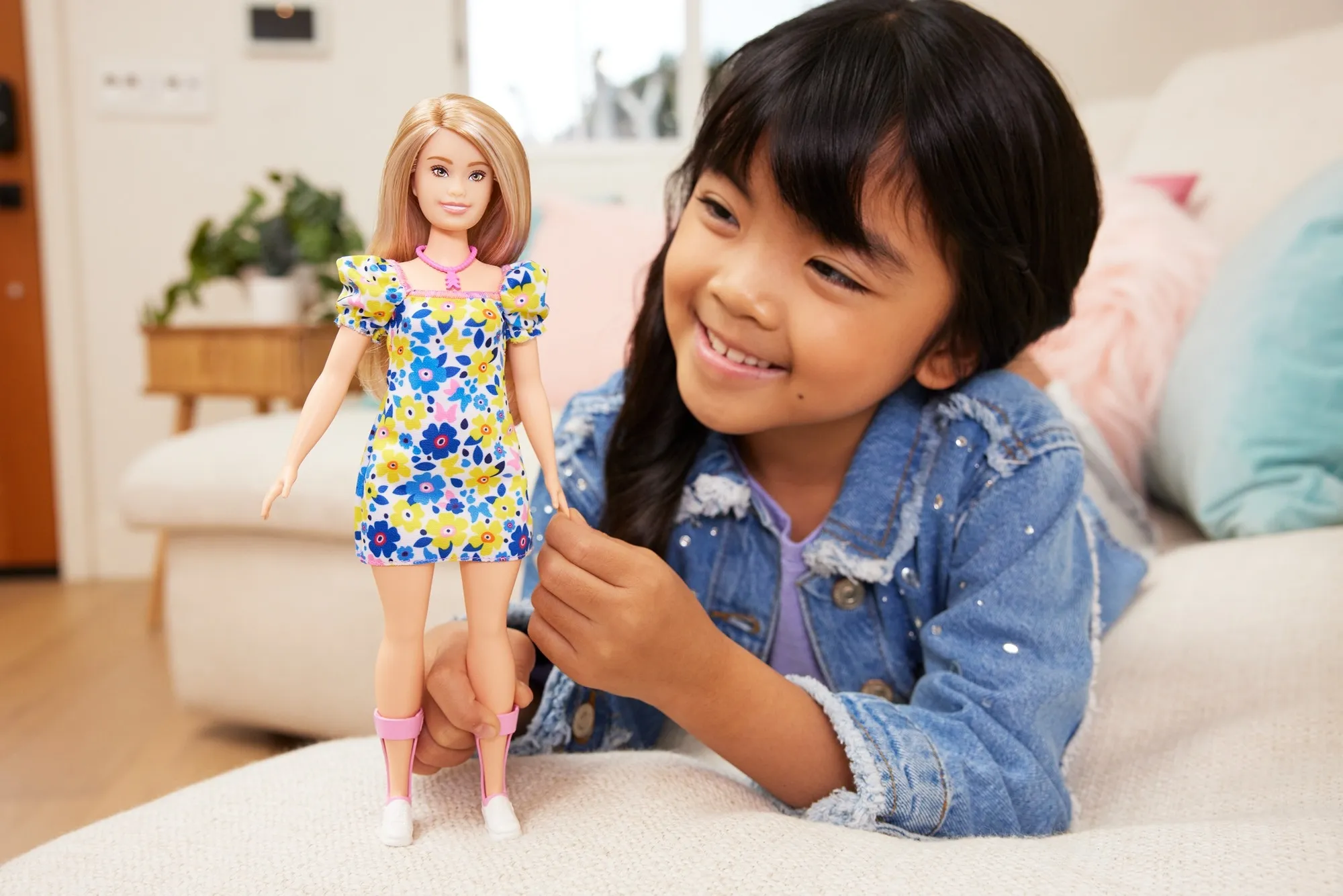 Mattel Barbie Fashionistas doll with Down Syndrome in a floral dress Mattel Barbie Fashionistas doll with Down Syndrome in a floral dress