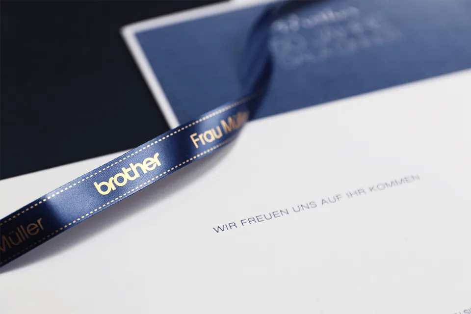 Brother TZeR tape 12mm x 4m gold on dark blue
